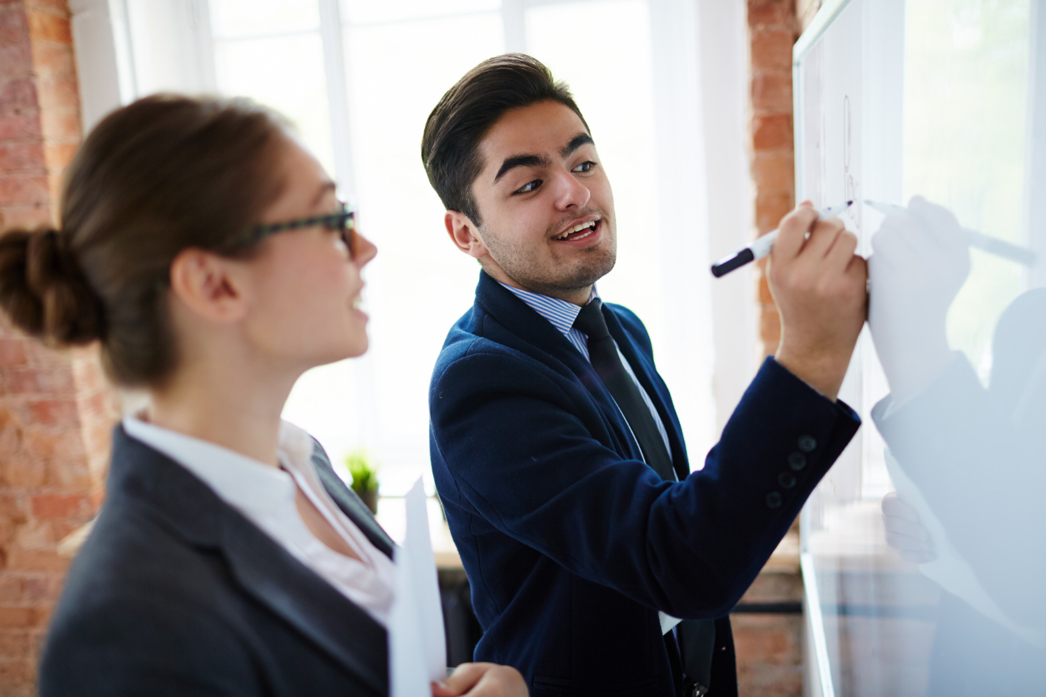 Professionals collaborating during a career coaching session